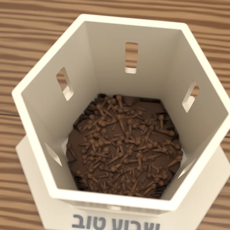 מבט מלמעלה לתוך מגדל הבשמים: ציפורן ממלא את התחתית, והחריצים בדפנות פתוחים לריח