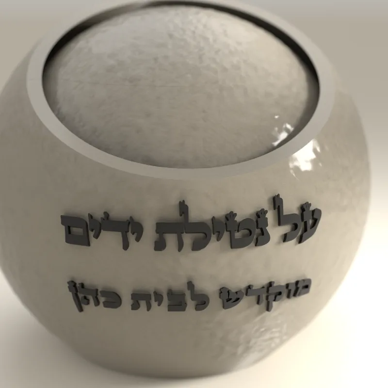 תקריב של פני הנטלה הכדורית באור צד: המרקם המחוספס וקווי השכבות של ההדפסה